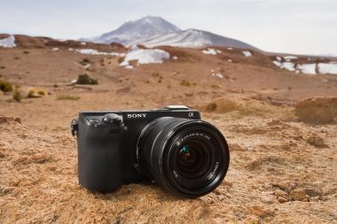 Advertising product photograph of a Sony camera in the landscape