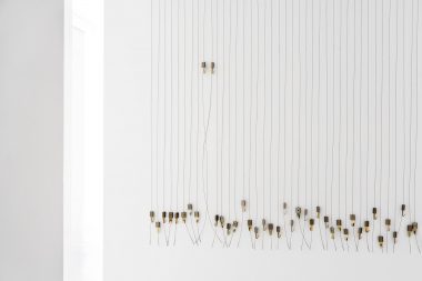 Wires used for hanging pictures in a gallery in Cape Town.