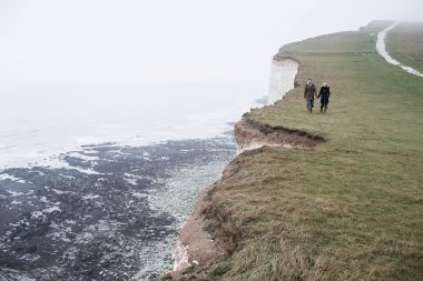 Couple walking at Beachy Head photographed by Richard Boll