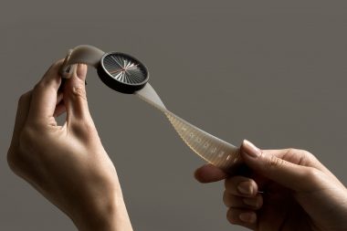 Layer Design photo shoot. Photograph of hands holding a watch in a London studio