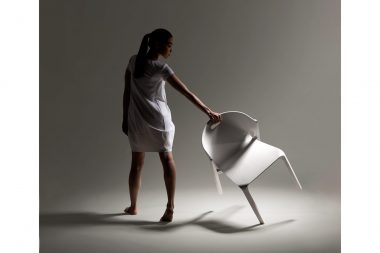Layer Design photo shoot. Photograph of a woman with a chair in a London photography studio