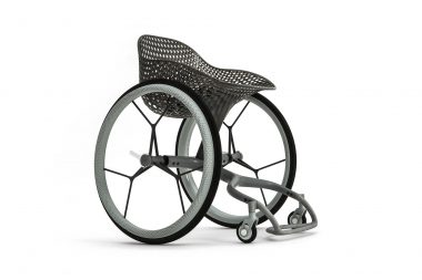 Photograph of a wheelchair against a white background in a London studio