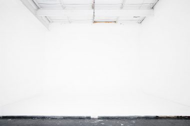 A white empty photography studio in London.