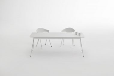 White table and chairs photographed for allermuir in a studio