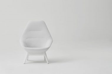 White chair on white background in a studio