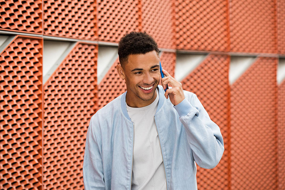 man-talking-on-phone-with-nolii-product-in-london