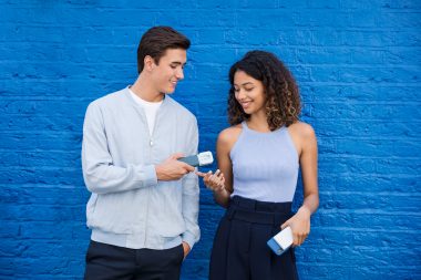lifestyle photograph of couple with phone accessories