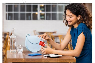 Woman in Cafe with nolii products. Richard Boll's Published Work.