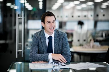 Corporate image of man in London office.