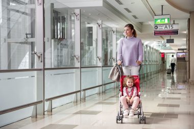 Advertising lifestyle photograph of woman with pushchair