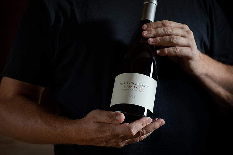 olivier-bernstein-with-bottle-of-wine-richard-boll-photography