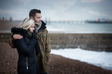 Couple on a beach photography by Richard Boll