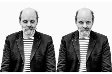A double portrait of the British artist Gavin Turk with his eyes closed and open