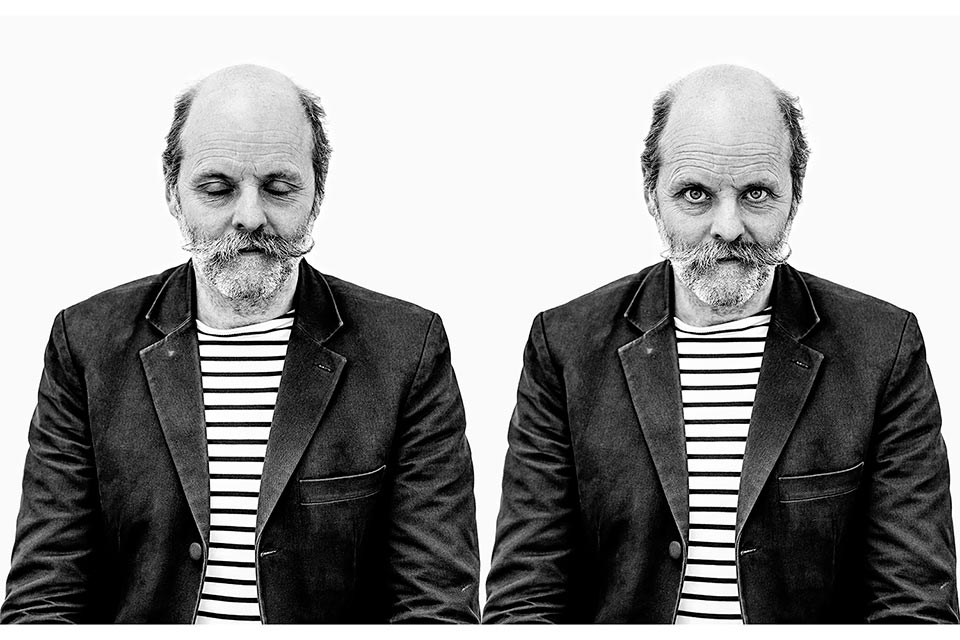 A double black and white photographic portrait of the artist gavin turk