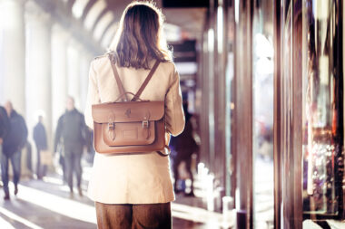 Lifestyle photography of a woman with a Cambridge Satchel Co satchel