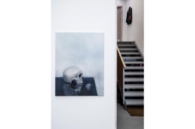 A painting of a skull by the artist Gavin Turk.