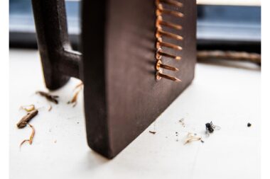 The sculpture 'Cadeau' or 'The Gift' by Man Ray with a dead fly in the studio.