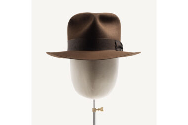 A product photograph of the Destiny Poet hat on a mannequin, the iconic Indiana Jones hat designed by Herbert Johnson.