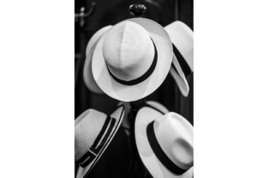 Panama hats on a rack in a shop on Savile Row in London.