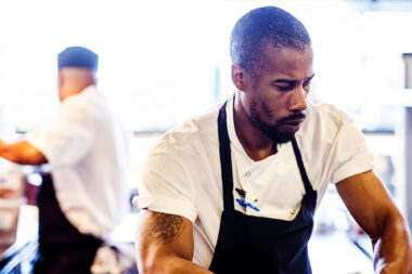 A chef working in the kitchen at the OXO Tower restaurant in London.