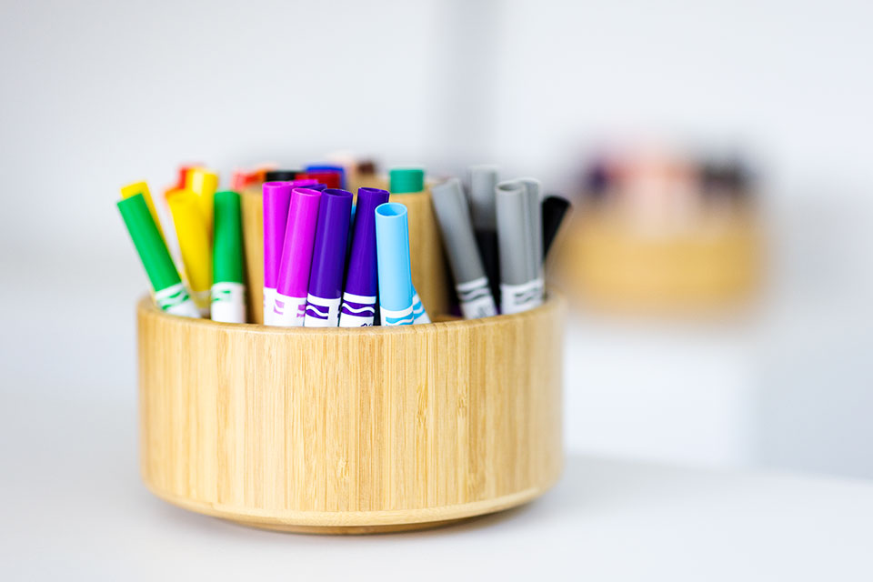 A close-up photograph of marker pens in an office photographed by Richard Boll.