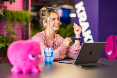 A woman with a laptop in the Kraken offices in London.