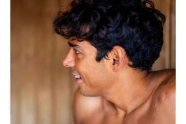 Close-up of a man's face in a sauna.