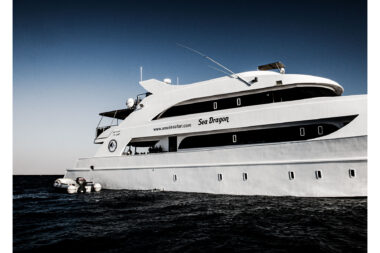 A liveaboard dive boat in the Red Sea in Egypt photographed from the sea- diving lifestyle photography.
