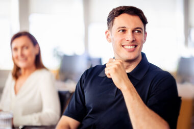 Fresh contemporary corporate lifestyle photograph of two people in a meeting in London.